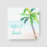 Toile Aquarelle de plage tropicale Palm Tree<br><div class="desc">Des peintures murales tropicales sur toile enveloppée avec une plage pittoresque aquarelle et un imprimé de palmier avec la légende "Life's a Beach". La légende peut être facilement customisée avec votre dicton préféré - il suffit de cliquer sur "personnaliser". Idéal pour une maison de plage, un décor de maison côtière...</div>