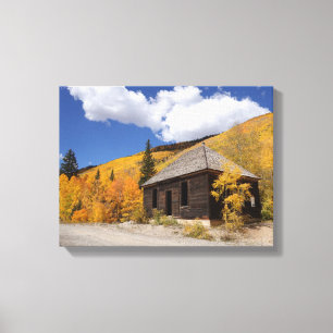 Toile Cabane rustique dans les bois dorés