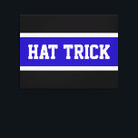 Toile CASQUETTE TRICK Royal Blue Black White Hockey Stri<br><div class="desc">Cette conception sportive de hockey présente un "CASQUETTE TRICK" athlétique à l'intérieur de bandes de centre bleu et blanc royal contre un arrière - plan noir.</div>