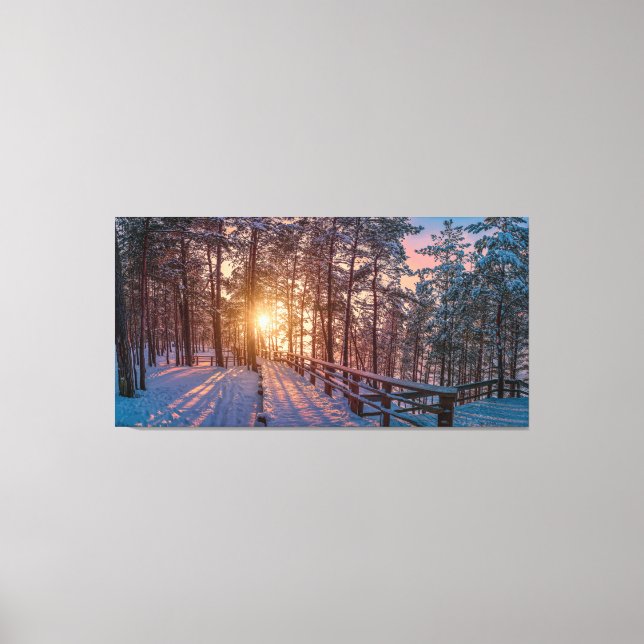 Toile Coucher de soleil dans la pinède enneigée avec ray (Recto)
