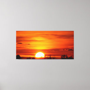 Toile Coucher de soleil doré sur le paysage rural