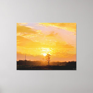 Toile Coucher de soleil doré sur paysage rural