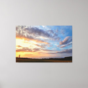 Toile Coucher de soleil vibrant sur champ ouvert 1