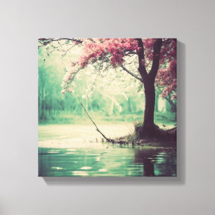 Toile Des fleurs roses paisibles sur un lac serein
