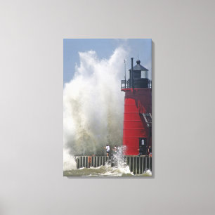 Toile Des gens sur une jetée regardent de grosses vagues