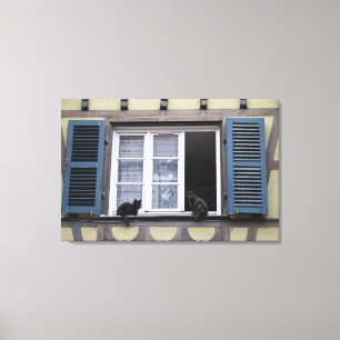 Toile Deux chats noirs à la fenêtre