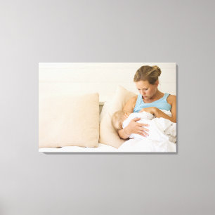 Toile Femme allaitant le bébé
