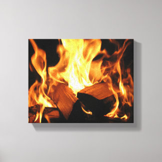 Toile Flammes sur des bûches en feu