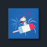 Toile Flying Ace Snoopy on Ice Pop<br><div class="desc">4 juillet cacahuètes | Découvrez Flying Ace Snoopy sur une glace pop rouge, blanche et bleue, surplombant les feux d'artifice dans le ciel !</div>