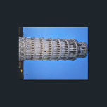 Toile Gift Bag<br><div class="desc">This captivating photograph showcases the iconic Leaning Tower of Pisa standing elegantly against a deep blue twilight sky in Pisa. The historic marble tower, famous for its unmistakable tilt, is beautifully illuminated, highlighting its intricate Romanesque arches and layered columns. The soft evening light creates a striking contrast between the glowing...</div>