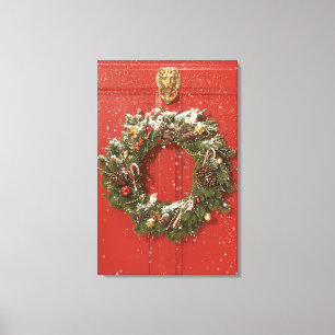 Toile Guirlande de Noël accrochant sur une porte