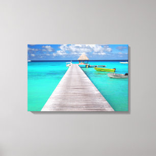 Toile Jetée avec bateaux dans un lagon tropical