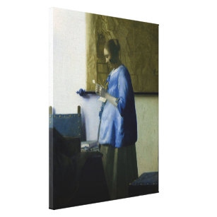 Toile Johannes Vermeer - Une femme en bleu lisant une le