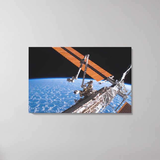 Toile Le Canadarm2 et les ailes de panneaux solaires (Recto)