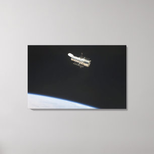 Toile Le télescope spatial de Hubble en orbite au-dessu