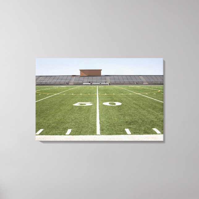 Toile Le terrain de football et le stade (Recto)