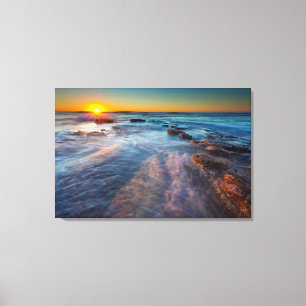 Toile Les rayons du soleil illuminent l'océan Pacifique