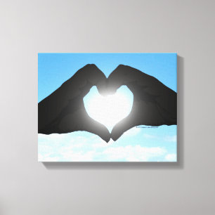 Toile Mains en forme de coeur Silhouette sur ciel bleu