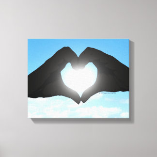 Toile Mains en forme de coeur Silhouette sur ciel bleu