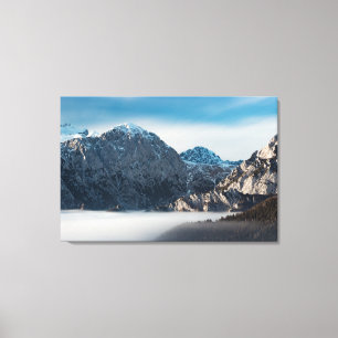 Toile Mer de brouillard et montagnes enneigées