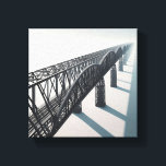 Toile Modern Minimalist Architectural Bridge - Infinite<br><div class="desc">A stunning digital artwork featuring a massive steel truss bridge stretching into an infinite, misty horizon. The composition utilizes a powerful diagonal perspective, showcasing the intricate geometric patterns of the industrial ironwork against a clean, minimalist background. Ideal for modern office spaces, industrial-themed interiors, or anyone who appreciates architectural precision and...</div>
