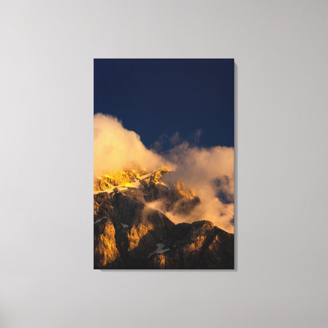 Toile Montagnes ensoleillées couvertes de nuages (Recto)