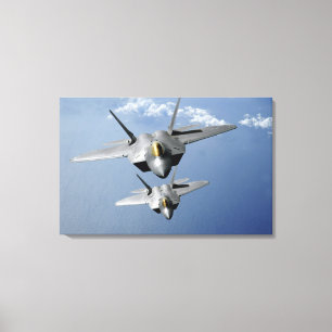 Toile Mouche de deux F-22 Raptors au-dessus de l'océan