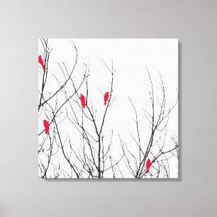 Toile Oiseaux rouges brillants sur les branches d'arbres