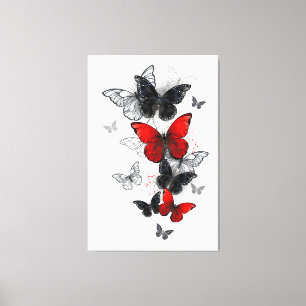 Toile Papillons noirs et rouges volants