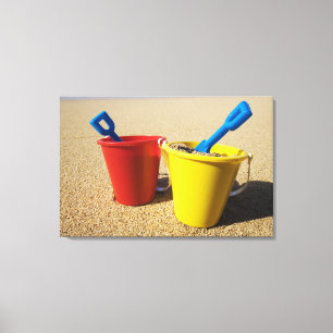 Toile Pelles et seaux sur la plage sablonneuse