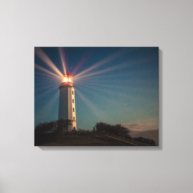 Toile Phare sur une colline brillant la nuit (Recto)