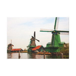 Toile Trois moulins à vent hollandais reflétés dans l'ea