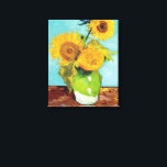 Toile Trois tournfleurs | Vincent Van Gogh<br><div class="desc">Tirage en toile d'art de Three Sunflowers (1888) de l'artiste néerlandais Vincent Van Gogh. L'oeuvre originale est une huile sur toile représentant une vie calme de tournesols jaunes brillants contre un arrière - plan turquoise. Cliquez sur Customiser pour modifier la taille de la toile ou personnaliser la conception.</div>