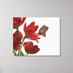 Toile un bouquet des tulipes rouges est visité par un