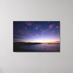 Toile Un coucher du soleil au-dessus de l'océan en le