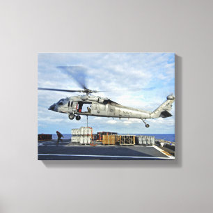 Toile Un MH-60S Seahawk prépare pour livrer l'ammunitio