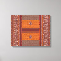 un motif de point de croix en orange et marron