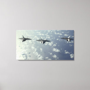 Toile Une formation de trois-bateau de F-22 Raptors