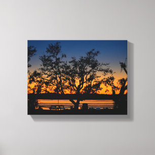 Toile Vue pittoresque sur le coucher du soleil sur la ri