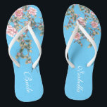 Tongs Fleurs roses Clair Bleu Mariage mariée<br><div class="desc">Les flops présentent une illustration de fleurs roses sur un arrière - plan bleu vif, et une typographie mariage classique des mots. Cette belle paire de tongs élégants serait un quelque chose de beau bleu pour un mariage de printemps ou d'été. customisez-le avec votre texte à l'aide des champs modèle....</div>