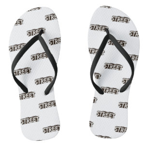 Tongs Une paire de pantoufles blanches