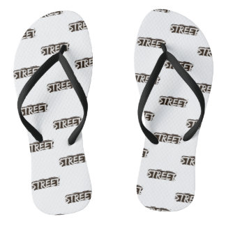 Tongs Une paire de pantoufles blanches