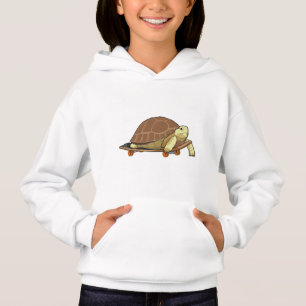 Tortue en patinage avec skateboard