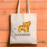 Tote Bag Adorable Tiger Kids Personnalisé<br><div class="desc">Le sac fourre-tout pour amoureux des animaux de cet enfant présente une jolie illustration d'un tigre. Personnalisez-le avec le nom de votre enfant en lettres noires. Fait un grand sac de livre pour les garçons ou les filles!</div>