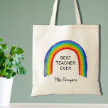 Tote Bag Aquarelle arc-en-ciel Enseignant Merci Cadeau<br><div class="desc">Le Sac fourre-tout de cet enseignant est décoré d'un arc-en-ciel comme un enfant et des mots Meilleur enseignant jamais. Facilement personnalisable avec le nom de votre professeur préféré.</div>