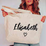 Tote Bag Bachelorette Coeur Personnalisé Voyage de fille de<br><div class="desc">Célébrez votre voyage inoubliable de filles avec le Sac fourre-tout Bridesmaid Custom Heart, un mélange parfait de style et de fonctionnalité pour chaque femme d'accueil. Cette fourre-tout personnalisée, conçue avec un graphique de coeur charmant, ajoute une touche unique à vos accessoires de fête de mariée, ce qui en fait un...</div>