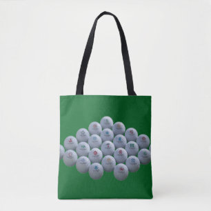 Tote Bag Balles de golf sur un fond vert sont sur un achat