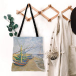 Tote Bag Bateaux de pêche | Vincent van Gogh<br><div class="desc">Bateaux de pêche sur la plage à Saintes-Maries (1888) par l'artiste post-impressionniste néerlandais Vincent Van Gogh. L'oeuvre d'origine est une peinture marine sur toile représentant plusieurs bateaux de pêche sur la côte océanique. Utilisez les outils de conception pour ajouter du texte personnalisé ou personnaliser l'image.</div>