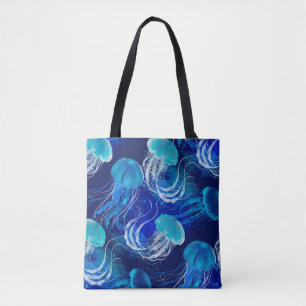 Tote Bag Beaucoup de méduses bleues nageant sous l'eau. Sea