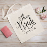 Tote Bag Bride Black Script Personalized Wedding<br><div class="desc">The Bride wedding tote bag features modern black swirling calligraphy script writing with elegant custom first name text that you can personalize for the bride to be. See our coordinating bridal party designs!</div>